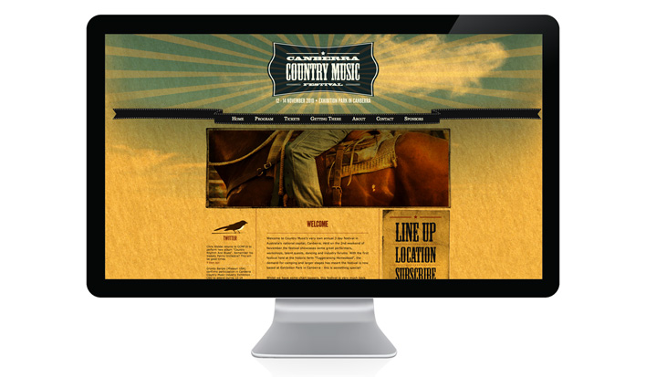 The home page for the Canberra Country Music Festival, which uses rich paper textures, warm photography to create a rustic country feel.